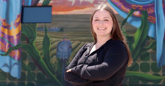A former kindergarten teacher, McKenna Fahrenbruch now serves as director of the Holdrege Area Early Childhood Partnership. She works closely with local providers, families and businesses to improve the quality of early education, increase access and strengthen the overall child care system in the south-central Nebraska community. (Photo by Erika Pritchard, UNK Communications)